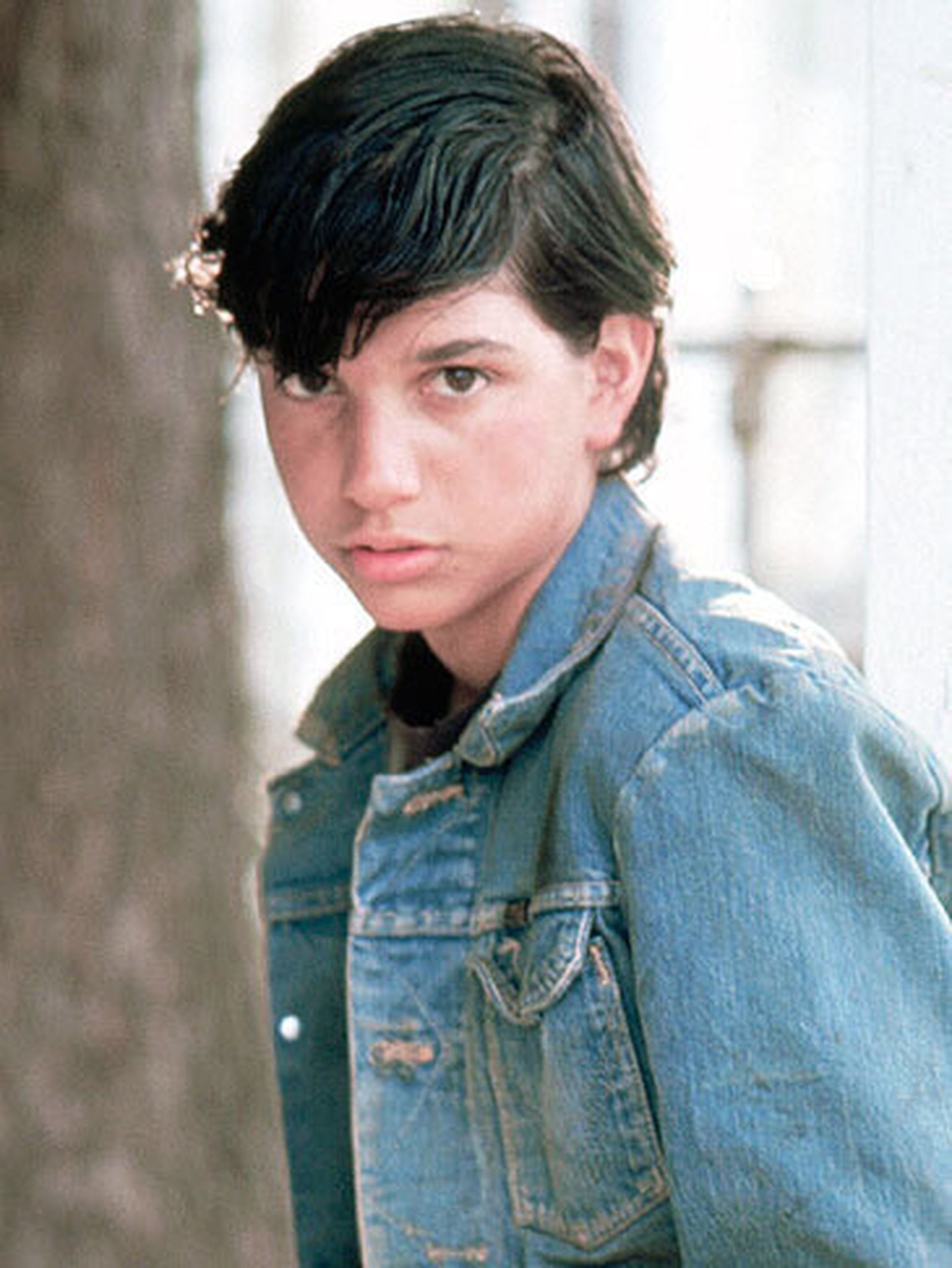 Why can't Dally accept Johnny's death in The Outsiders?